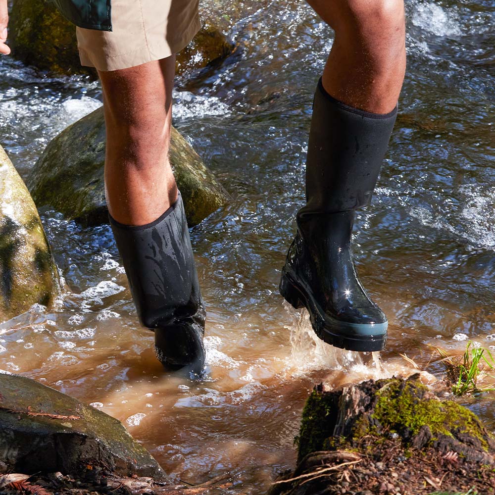 Tall black rubber store boots